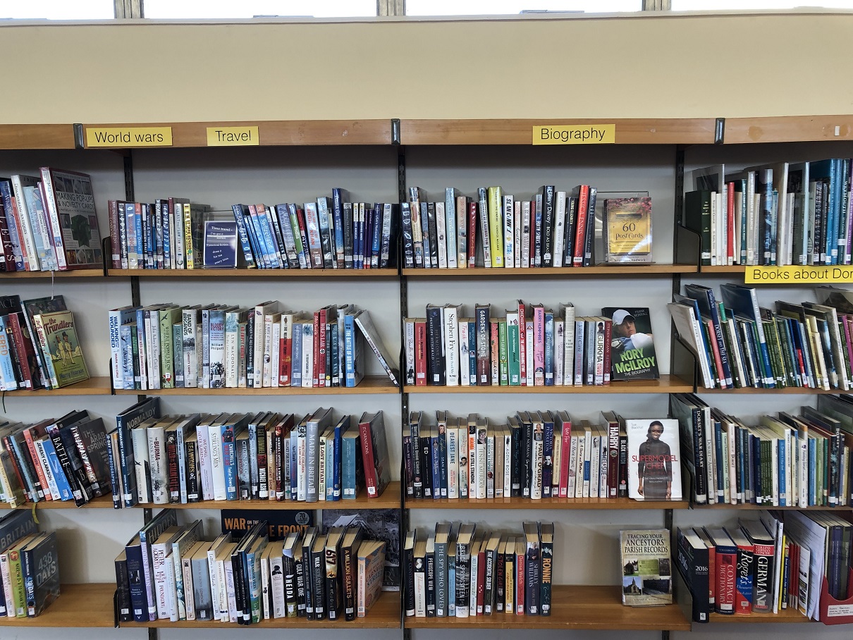 In the library there will be shelves of books and DVDs