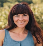 Smiling lady with dark hair