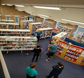 people looking around library