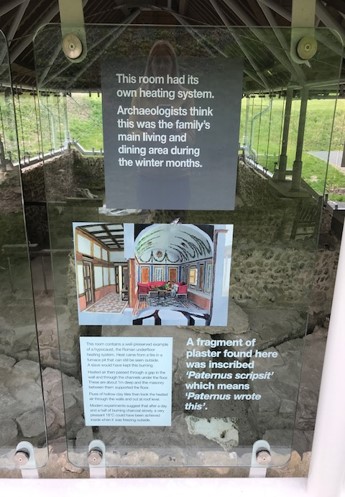 New interpretation panel on a window of the Roman Town House in April 2021