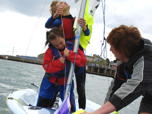 Two children sailing in Weymouth