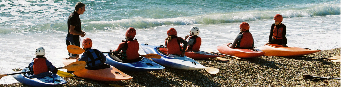 A group of students getting ready to canoe