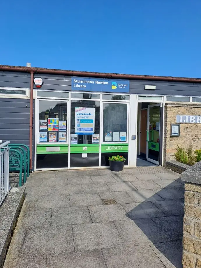 This is a picture of the entrance to Sturminster Newton Library.  There is a push button to release door on the left wall.