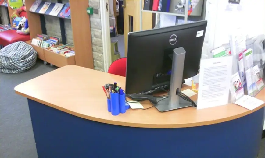 This is a picture of a desk with computer screen.