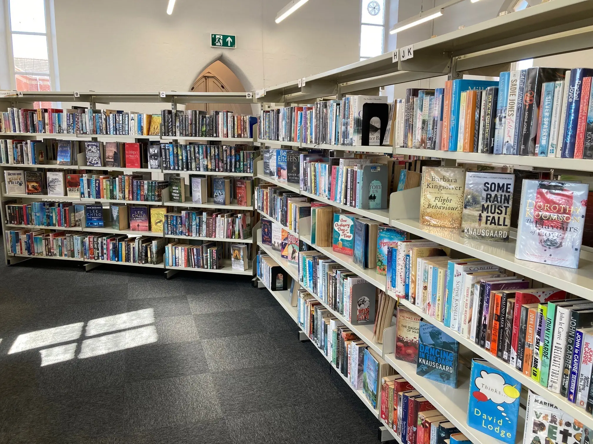 This is a picture of large shelving units full of books.