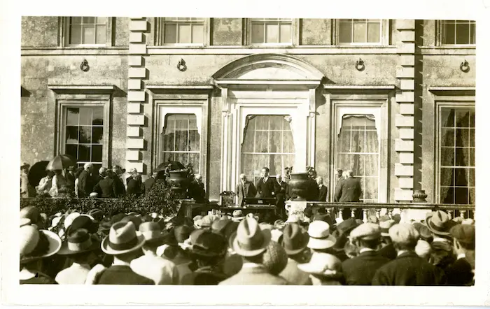 H.J. Ralph Bankes at Kingston Lacy on his 21st birthday, with a crowd gathered on the lawn, 1923