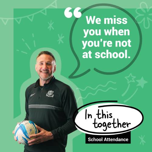 We miss you when you're not in school image of PE teacher holding a football to save