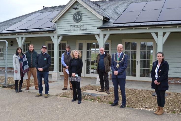 A group of people stood outside the Pavilion in the Park