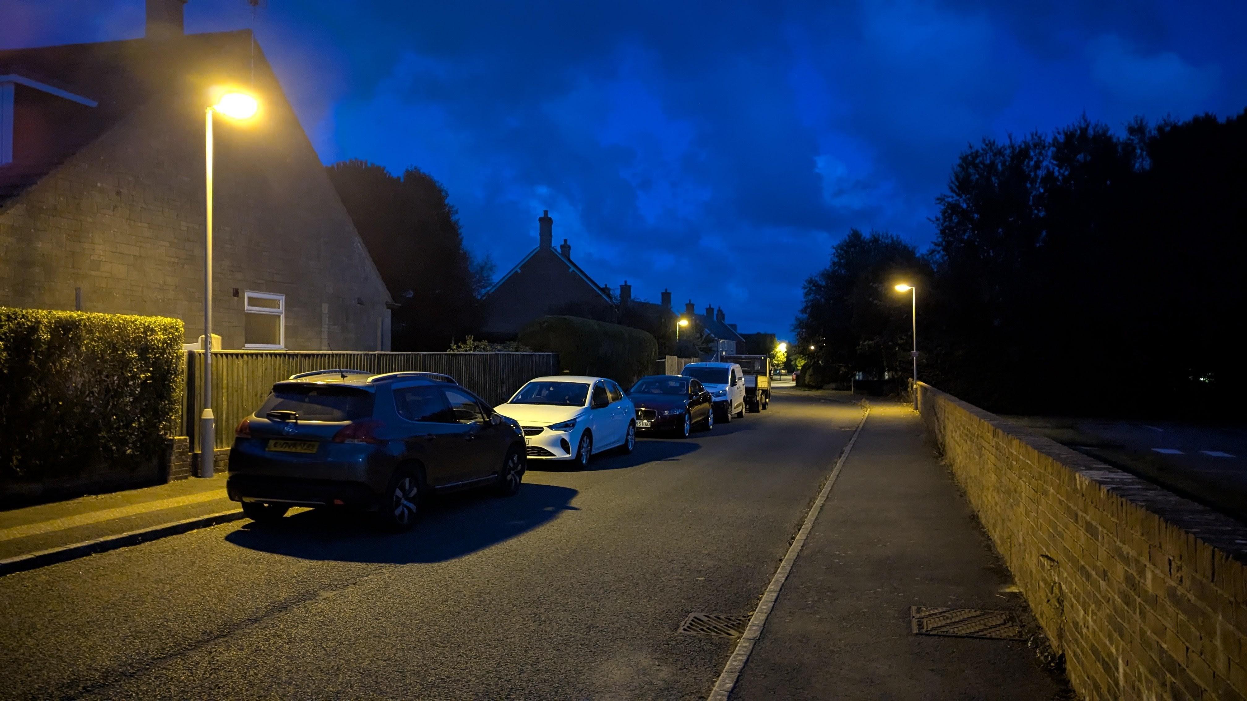 Street in Maiden Newton at night, with street lighting prominent