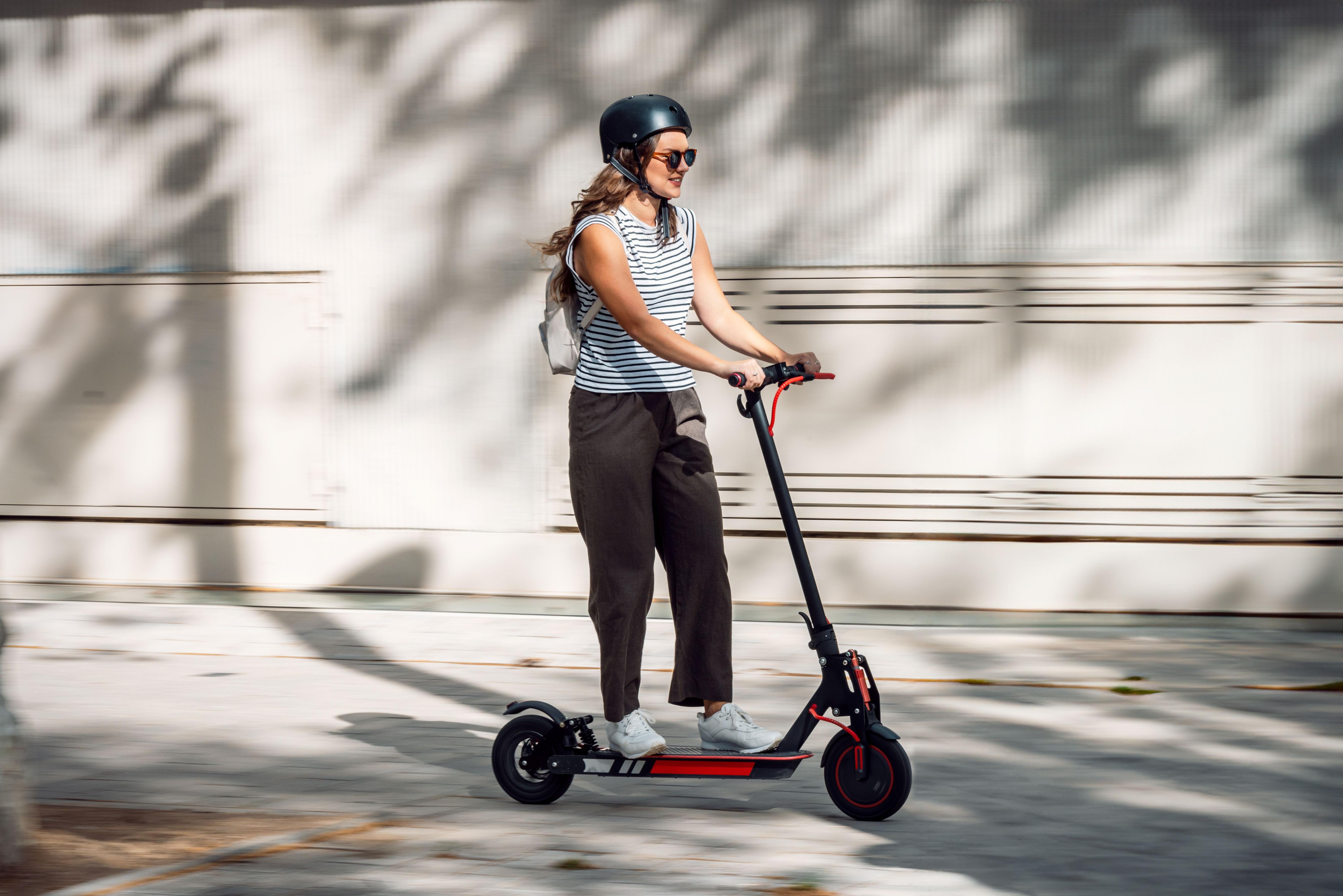 Woman on an e-scooter