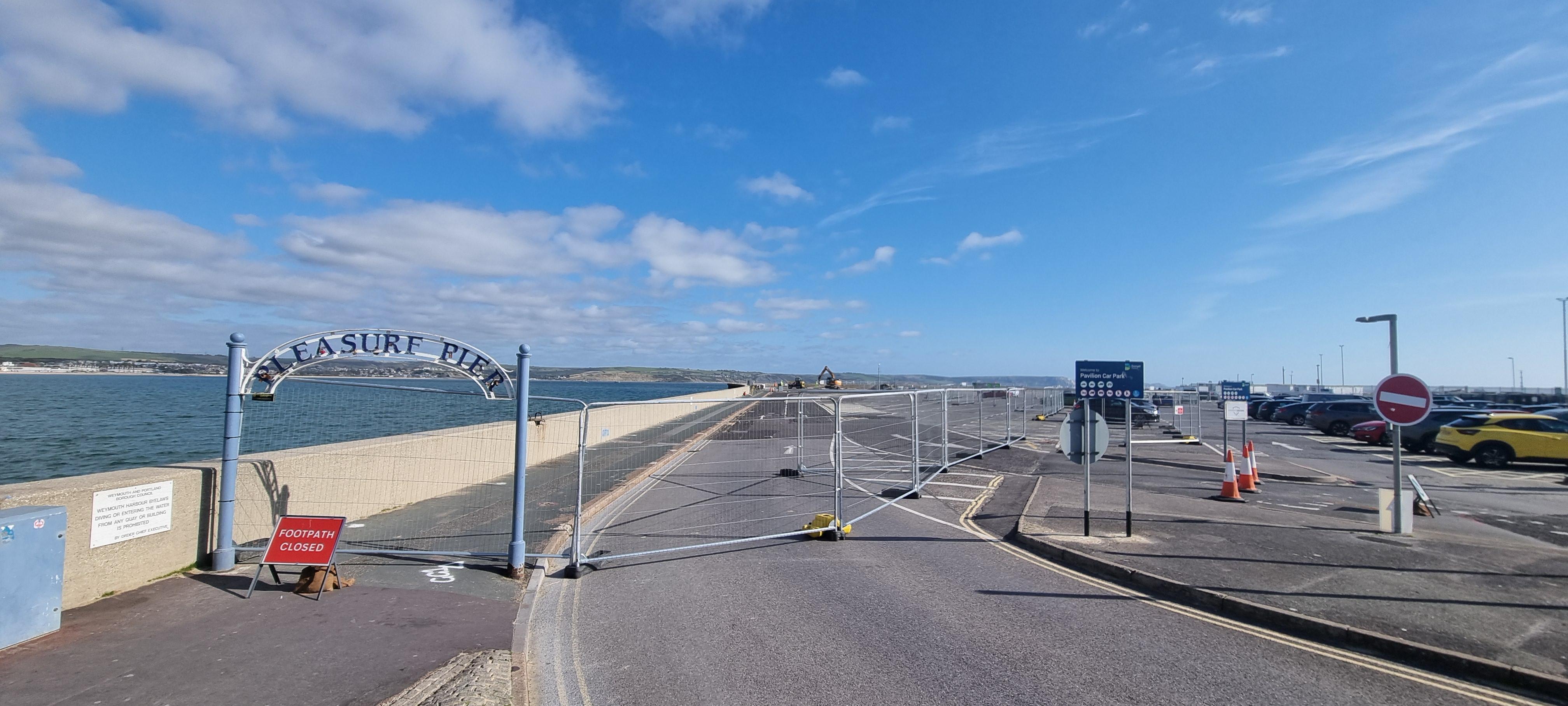 The Pleasure Pier and Pavilion carpark in Weymouth. Part of which is sectioned off using Heras fencing.