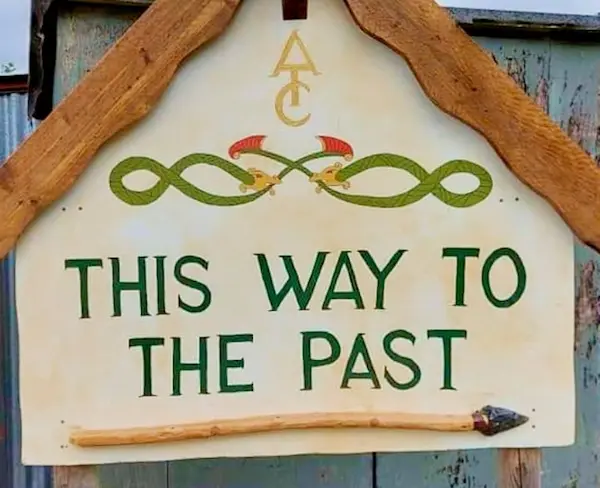 a sign for the Ancient Technology centre which says, "This way to the past"