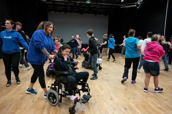Picture of a group taking part in a performing arts class