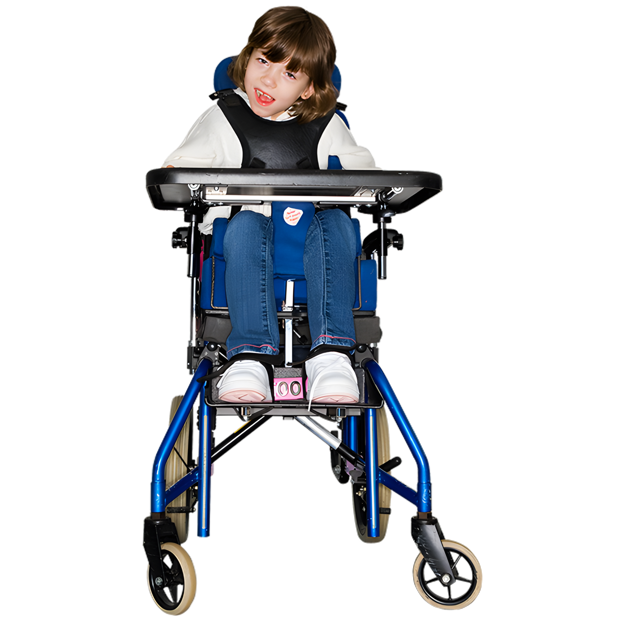 Child smiling in a wheelchair