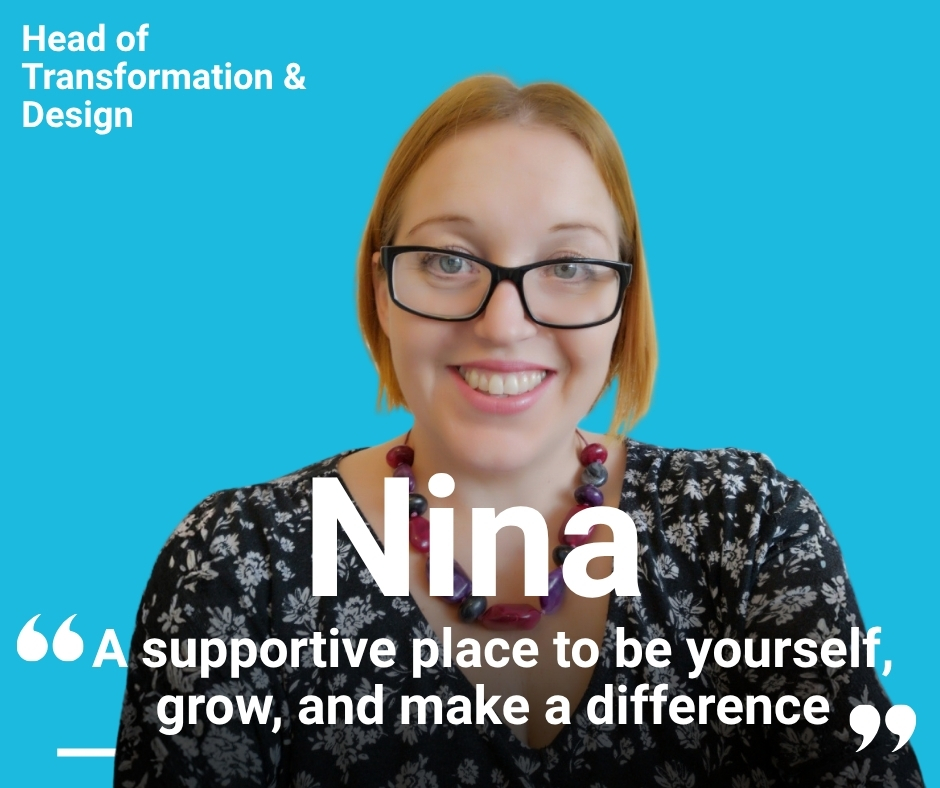 Nina smiling wearing a black floral top with "A supportive place to be yourself, grow and make a difference" quotation