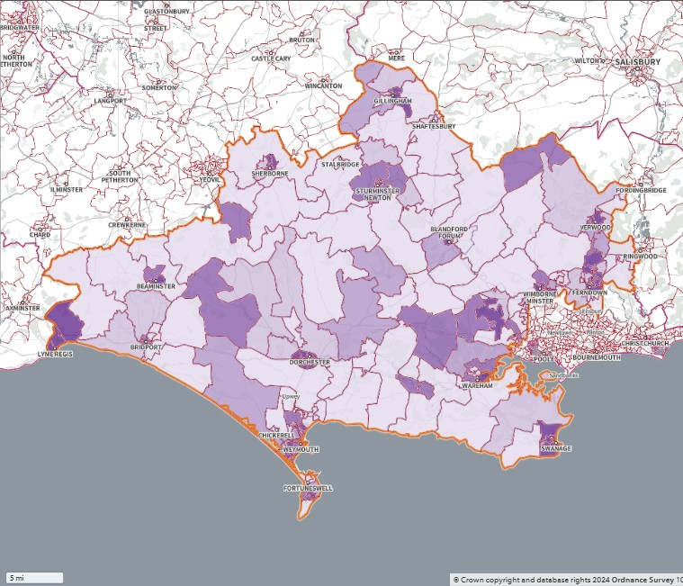 A map showing access to GP surgeries by public transport or walking within 15 minutes across Dorset, England. Areas are shaded in varying tones of purple, with darker shades indicating better accessibility and lighter shades indicating poorer access. The boundaries of Dorset are outlined in red, and surrounding regions are included for context. The map highlights geographic disparities in healthcare access. A copyright notice at the bottom reads: "© Crown copyright and database rights 2022 Ordnance Survey 100019690 | parallel | Mapbox | OpenStreetMap contributors.