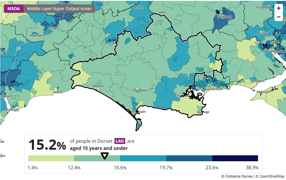 Map of Dorset showing the percentage of people aged 15 years and under across different areas. A colour gradient from light green to dark blue represents percentage ranges from 1.4% to 38.9%. The legend indicates that 15.2% of Dorset’s population is aged 15 and under, with specific regions shaded according to their respective percentages.