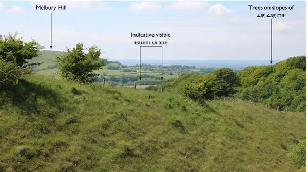 Viewpoint 6: View looking south west from the public bridleway adjacent to the B3081 road near the top of Zig Zag Hill. A limited portion of the trees comprising the southern end of the site are visible within layers of nearby trees.The changes to the view are therefore likely to be barely perceptible.
