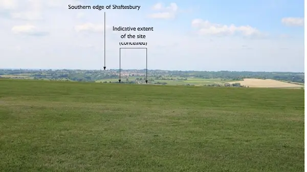 Viewpoint 9: View looking north west from the outdoor area at the cafe at Compton Abbas Airfield The trees within the site boundary are concealed from view behind the shoulder of land comprising the runway of the airfield.