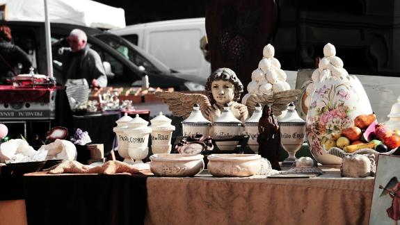 Boot sale table with various items