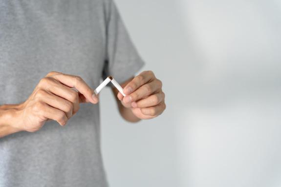Man snapping cigarette